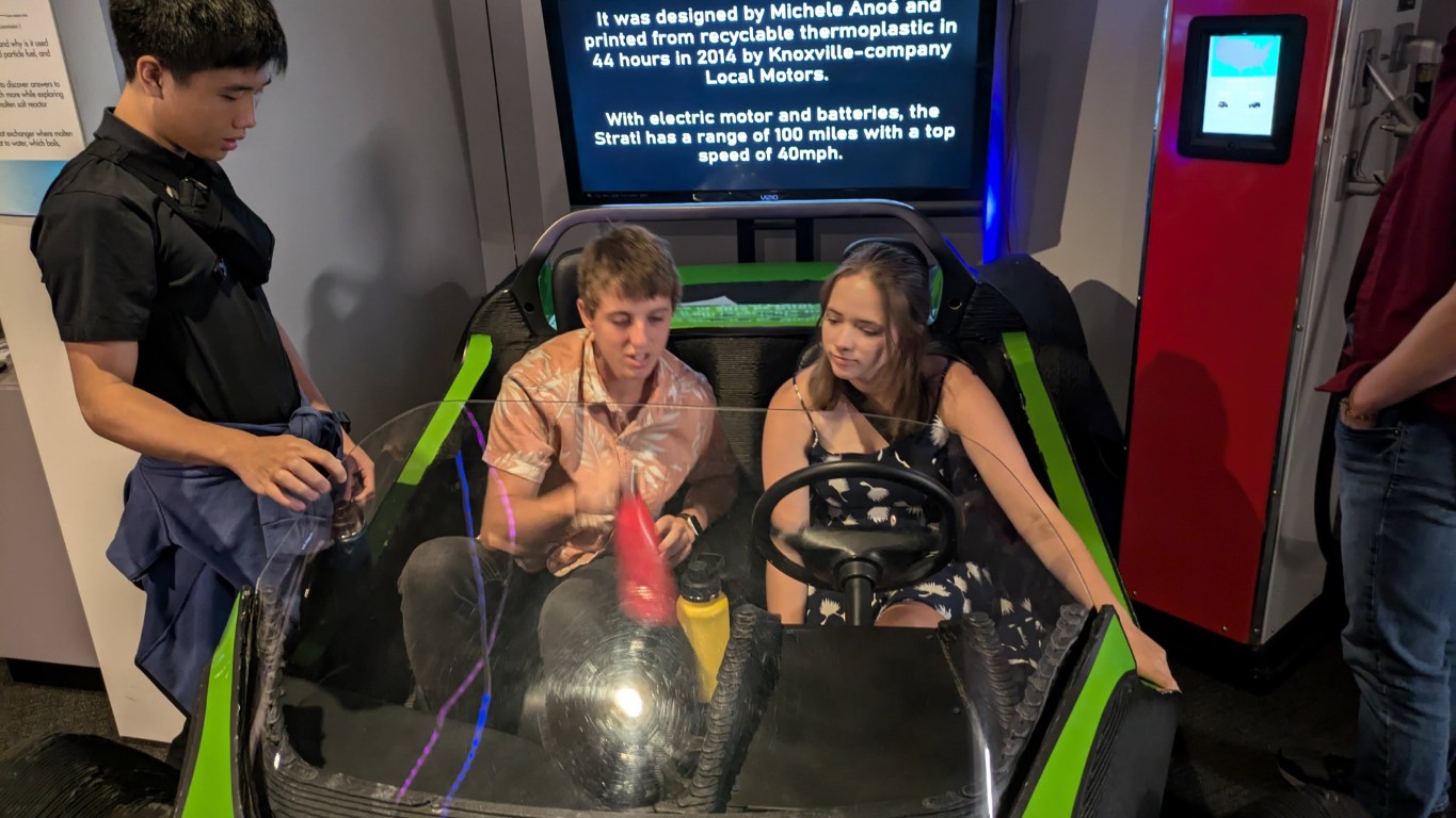 tim and maddie in a 3d-printed car